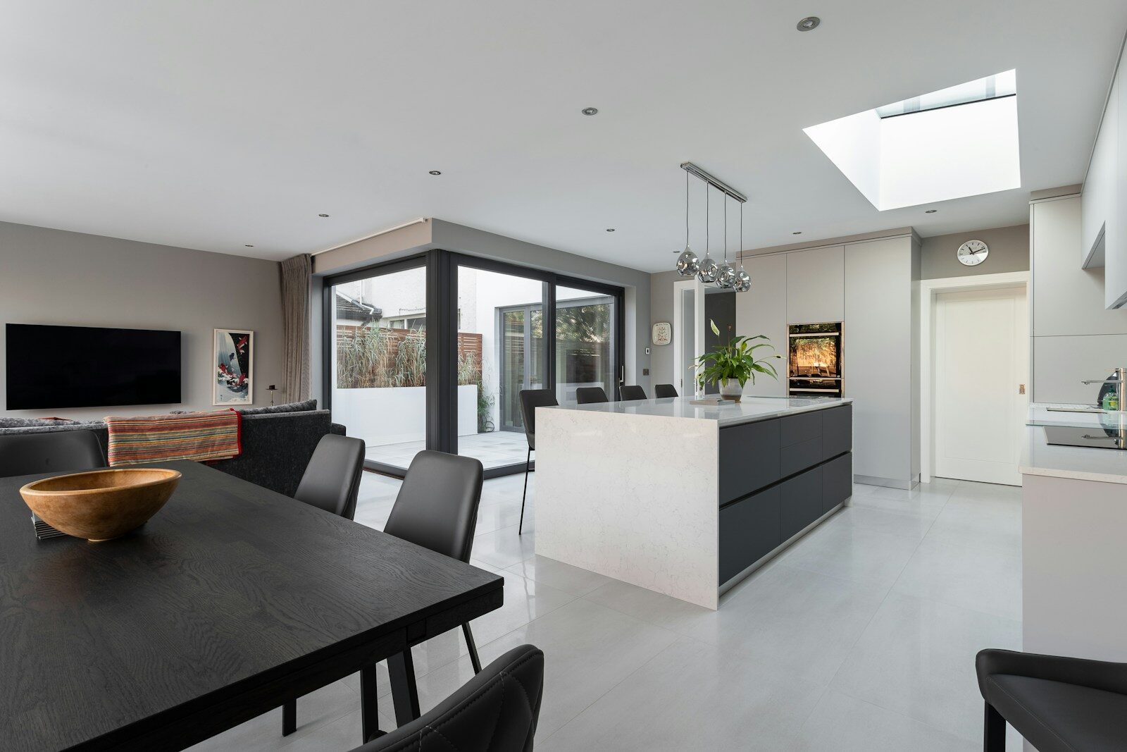 a kitchen with a dining table